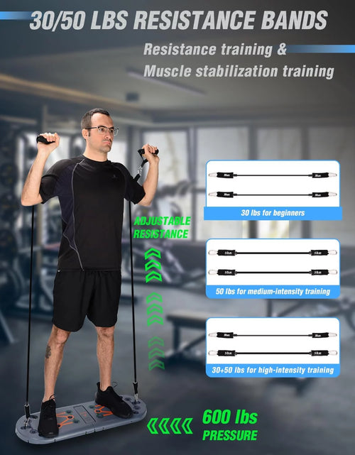 Load image into Gallery viewer, Foldable push-up board with resistance bands for strength training.
