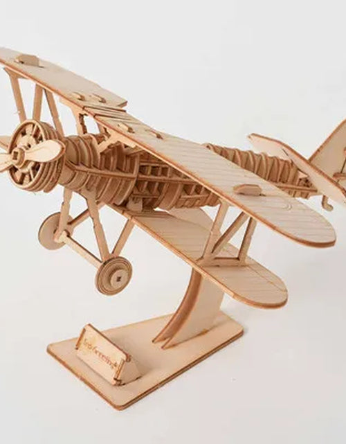 Load image into Gallery viewer, Engaging 3D Wooden Puzzle Kit: Assemble Your Own Sailing Ship, Biplane, and Steam Locomotive - Perfect for Adults and Kids 12+
