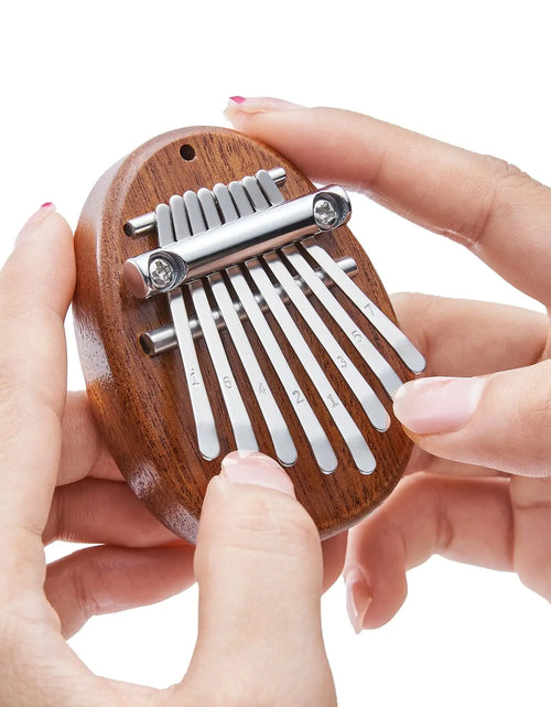 Load image into Gallery viewer, Mini Kalimba 8-Key Thumb Piano - Portable Water Drop Design, Ideal Gift Set for Children
