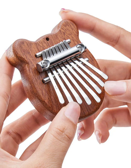 Load image into Gallery viewer, Mini Kalimba 8-Key Thumb Piano - Portable Water Drop Design, Ideal Gift Set for Children
