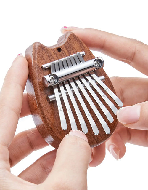 Load image into Gallery viewer, Mini Kalimba 8-Key Thumb Piano - Portable Water Drop Design, Ideal Gift Set for Children
