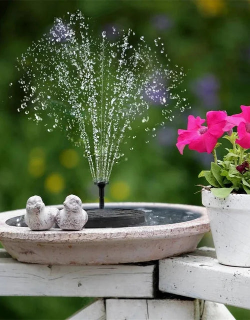 Load image into Gallery viewer, Solar-powered fountain with birds bathing

