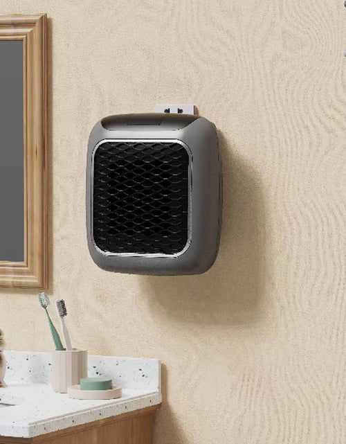 Load image into Gallery viewer, 800W Wall-Mounted Mini Heater: High-Efficiency PTC Ceramic Electric Heater with Remote Control for Home and Small Bathrooms
Efficient Heating Solution for Small Rooms

